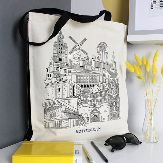 Nottingham illustration featuring all the well known buildings and landmarks of the city on a 100% cotton canvas tote bag with black straps and side panels. 