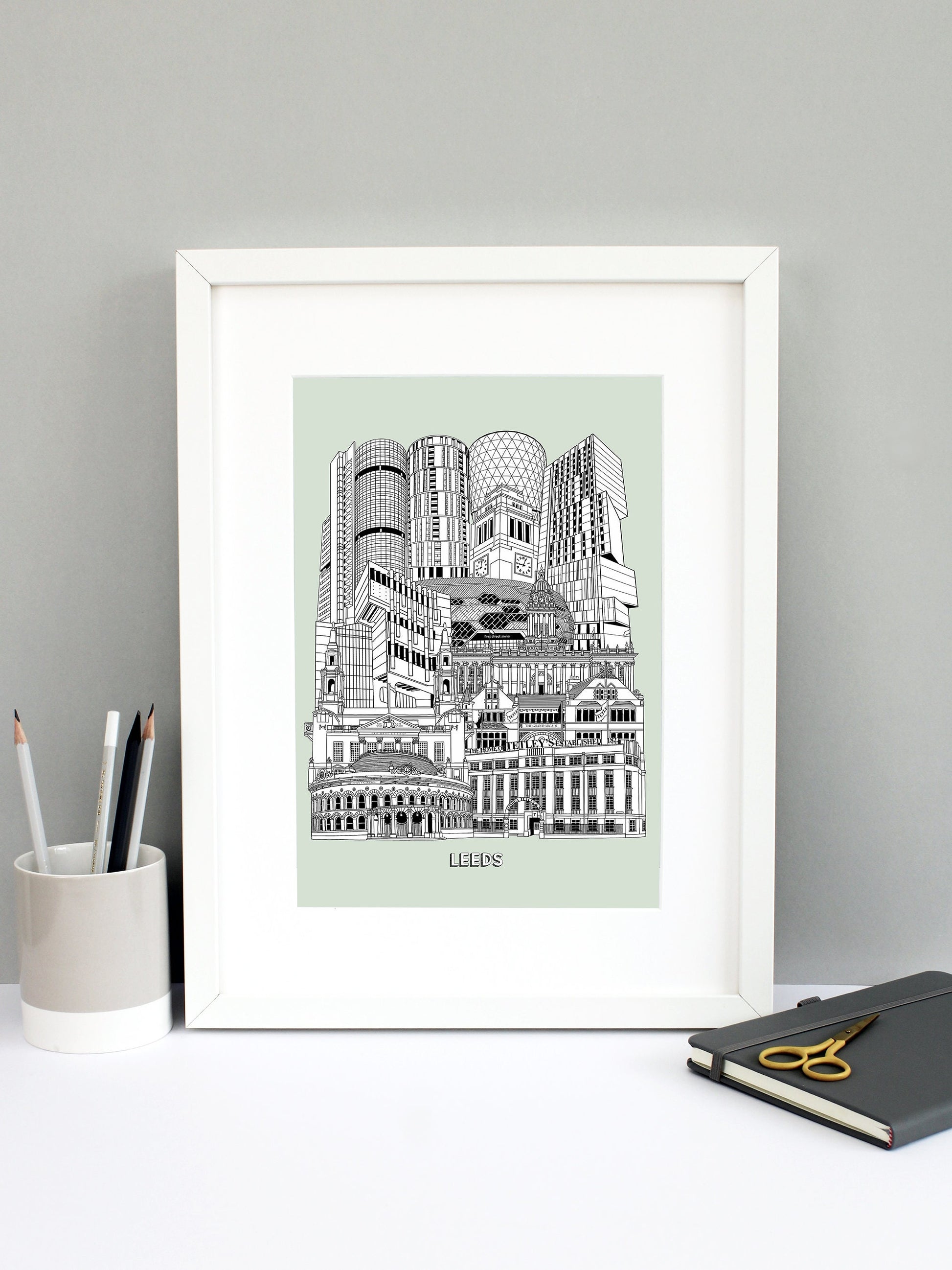 Beautifully detailed Leeds Illustration print. The perfect gift for an engagement, wedding, birthday, anniversary and house warming. It features all the well known buildings and landmarks from the vibrant UK city. The buildings and landmarks featured are: The Corn Exchange, The Tetley, Grand Arcade, Civic Hall, Roger Stevens Building, Town Hall, First Direct Arena, Broadcasting Tower, Rose Bowl at Leeds Metropolitan University, Parkinson Building clock tower, Candle House and Bridgewater Place.