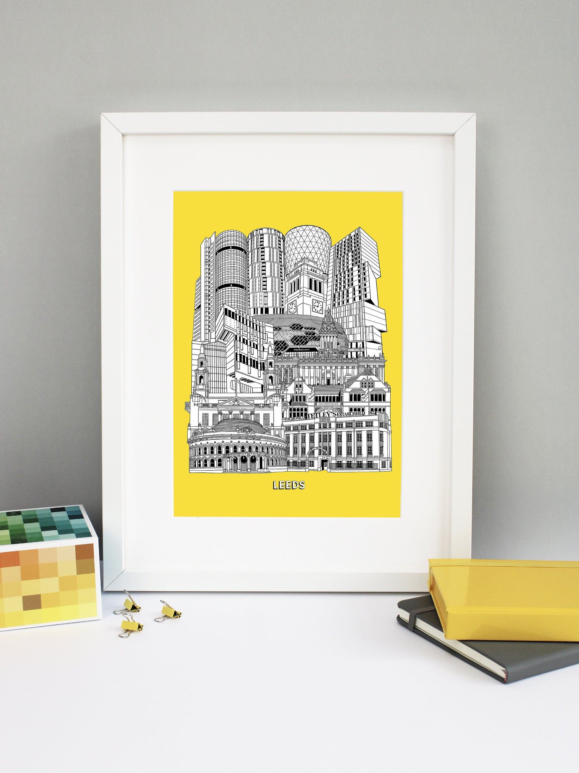 Beautifully detailed Leeds Illustration print. The perfect gift for an engagement, wedding, birthday, anniversary and house warming. It features all the well known buildings and landmarks from the vibrant UK city. The buildings and landmarks featured are: The Corn Exchange, The Tetley, Grand Arcade, Civic Hall, Roger Stevens Building, Town Hall, First Direct Arena, Broadcasting Tower, Rose Bowl at Leeds Metropolitan University, Parkinson Building clock tower, Candle House and Bridgewater Place.