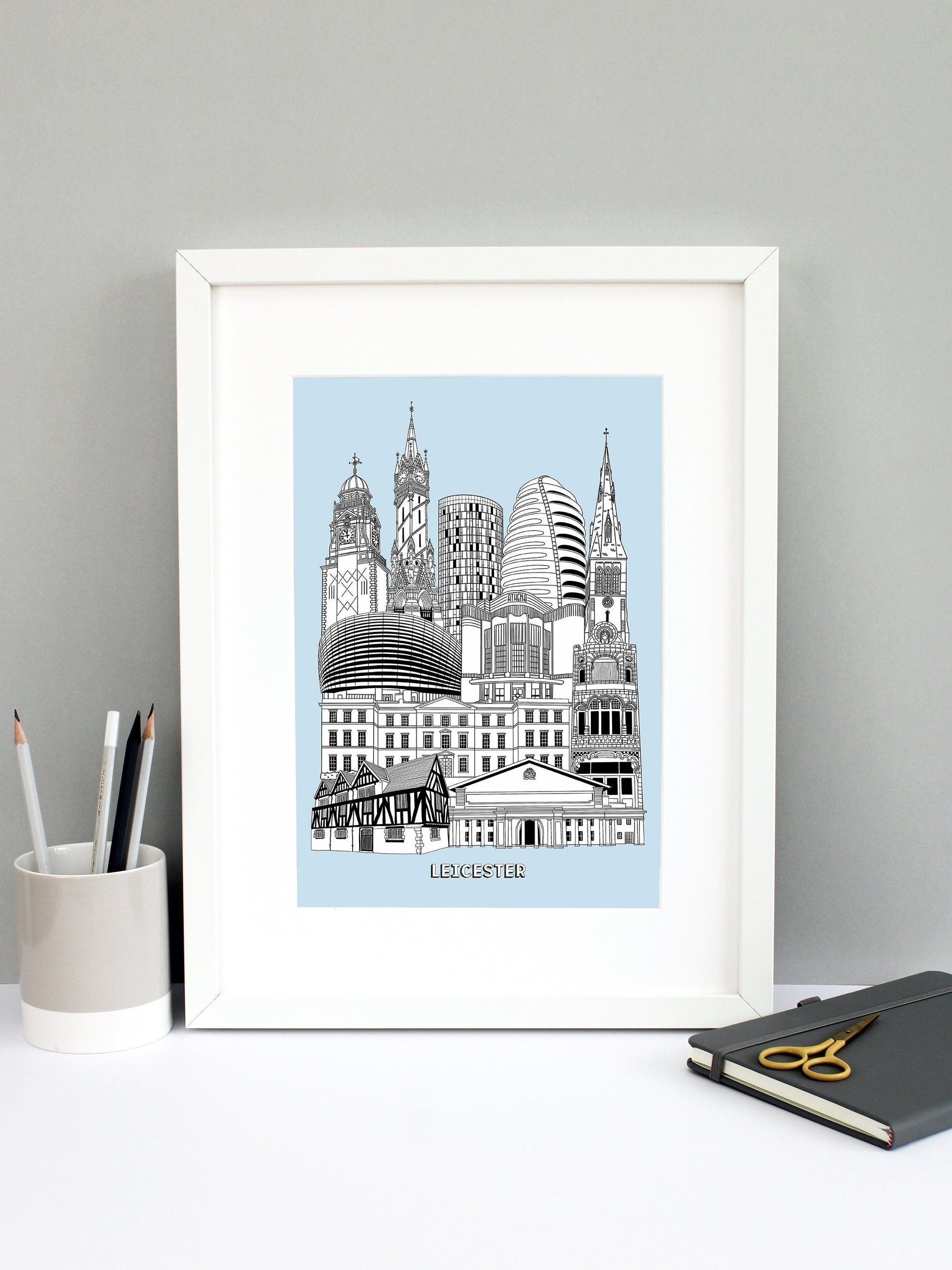 Beautifully detailed Leicester Illustration print. The perfect gift for an engagement, wedding, birthday, anniversary and house warming. It features all the well known buildings and landmarks from the vibrant UK city. The buildings and landmarks featured are: The Guildhall Museum, De Montfort Hall, the Turkey Cafe, University of Leicester, the Curve Theatre, Athena (originally the Odeon), Leicester Cathedral, National Space Centre, the Summit (aka the loo roll!), Haymarket Memorial Clock Tower and the Town 