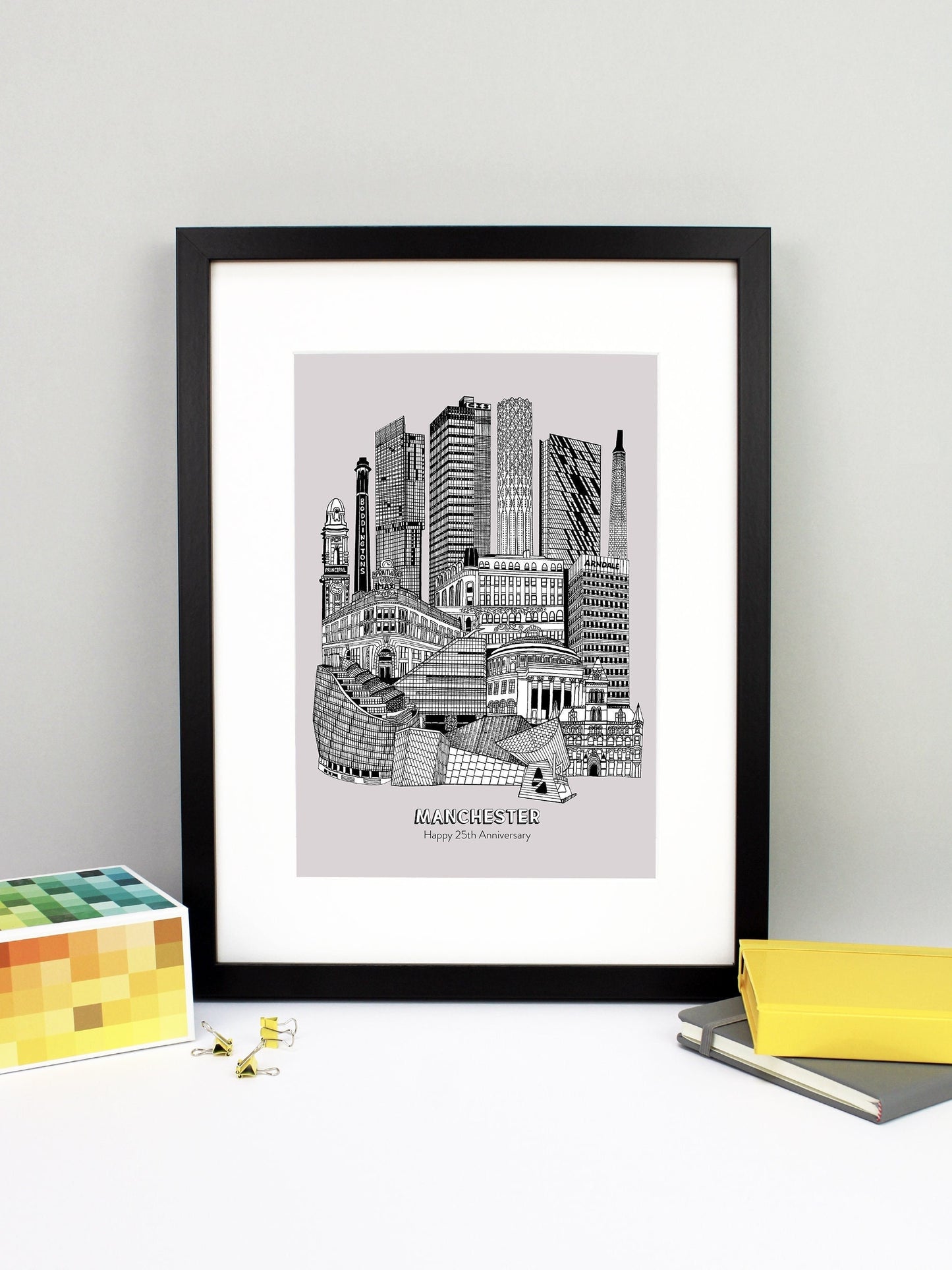 Beautifully detailed Manchester Illustration print. The perfect gift for an engagement, wedding, birthday, anniversary and house warming. It features all the well known buildings and landmarks from the vibrant UK city. The buildings and landmarks featured are: The Lowry, Angel Row, The Printworks, The Principal Hotel, Boddingtons Chimney, Beetham Tower, CIS Tower, Tower of Light, Axis Tower, Macintosh Factory Chimney, Afflecks Palace, Arndale Centre, The Urbis, Manchester Central Library and Manchester Town