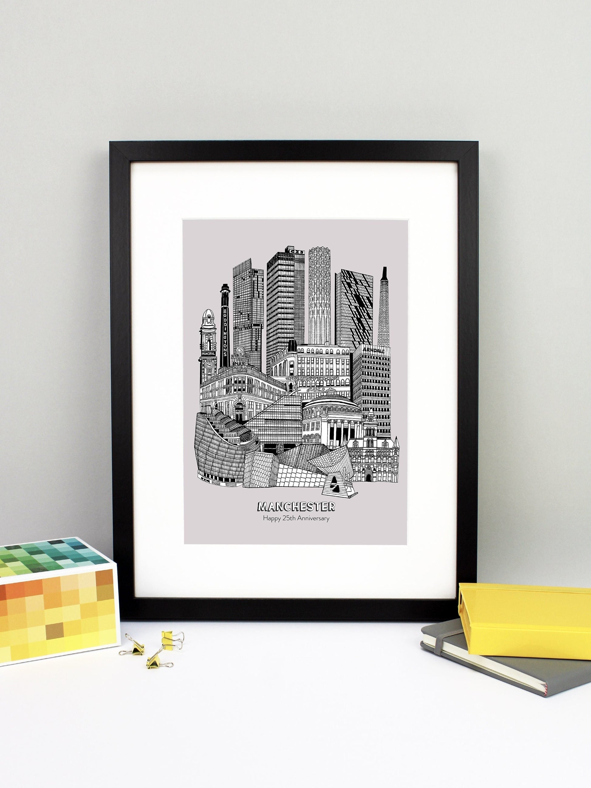 Beautifully detailed Manchester Illustration print. The perfect gift for an engagement, wedding, birthday, anniversary and house warming. It features all the well known buildings and landmarks from the vibrant UK city. The buildings and landmarks featured are: The Lowry, Angel Row, The Printworks, The Principal Hotel, Boddingtons Chimney, Beetham Tower, CIS Tower, Tower of Light, Axis Tower, Macintosh Factory Chimney, Afflecks Palace, Arndale Centre, The Urbis, Manchester Central Library and Manchester Town
