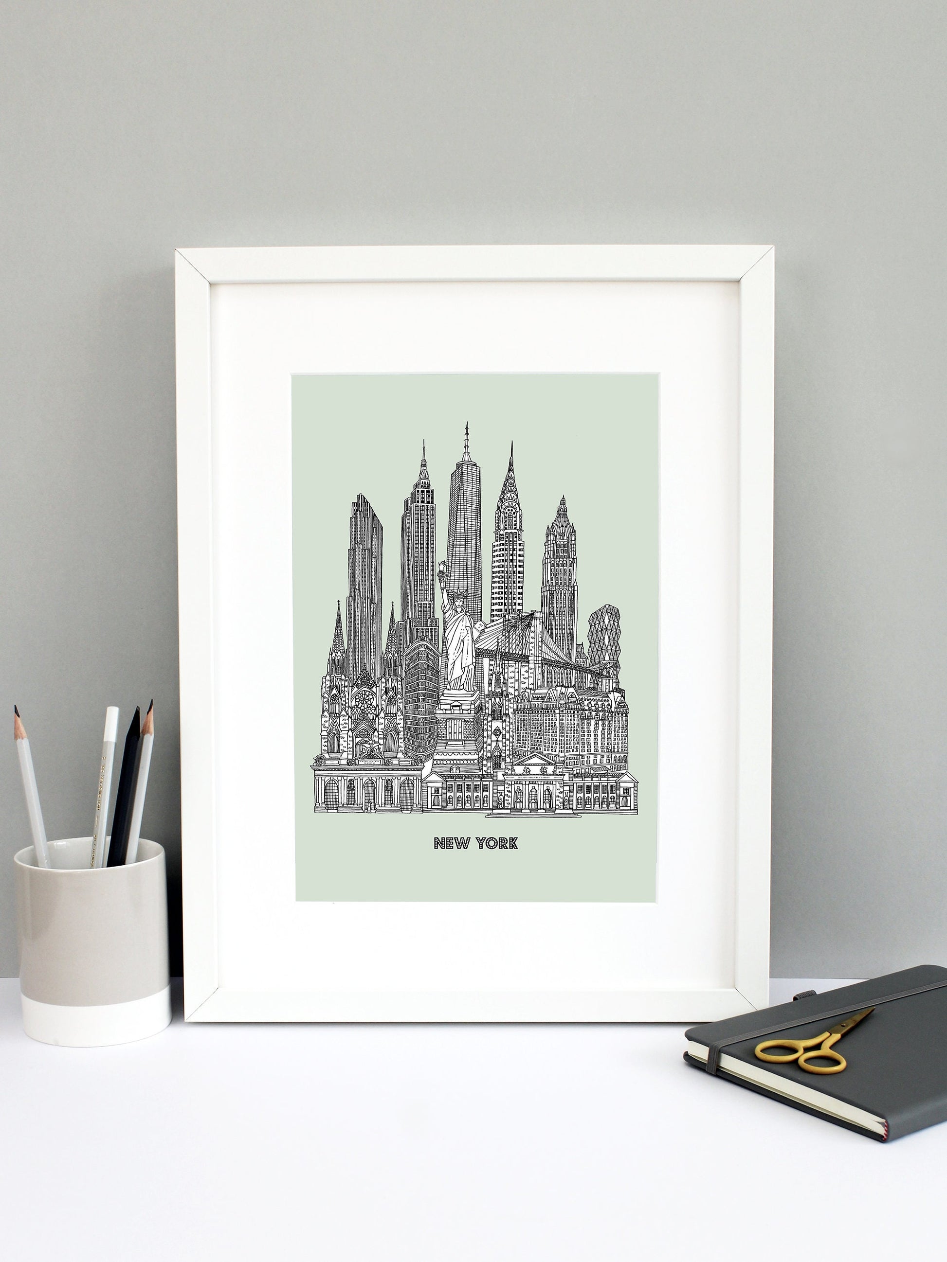 Beautifully detailed New York City illustration print. The perfect gift for an engagement, wedding, birthday, anniversary and house warming. It features all the well known buildings and landmarks from the vibrant city. The buildings and landmarks featured are: Grand Central Terminal, The New York Public Library, Plaza Hotel, Trinity Church, Statue of Liberty, Flatiron Building, St Patrick's Cathedral, Brooklyn Bridge, Hearst Tower, Woolworth Building, Chrysler Building, One World Trade Center aka The Freedo