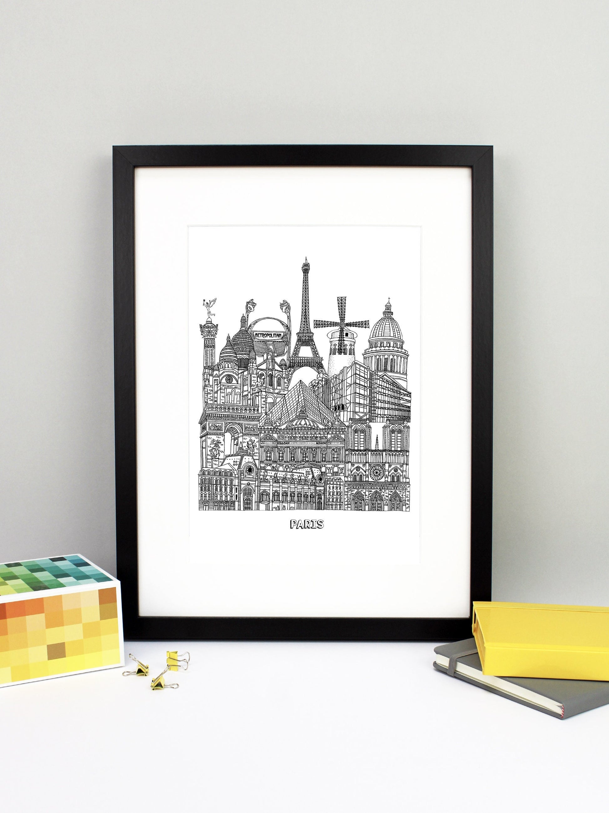 Beautifully detailed Paris Illustration print. The perfect gift for an engagement, wedding, birthday, anniversary and house warming. It features all the well known buildings and landmarks from the vibrant city. The buildings and landmarks featured are: Musée d'Orsay, Notre-Dame, The Palais Garnier, Arc de Triomphe, Louvre Museum, The Centre Pompidou, Sacré-Cœur, The Paris Métro, The July Column, The Eiffel Tower, Moulin Rouge windmill and the Panthéon.