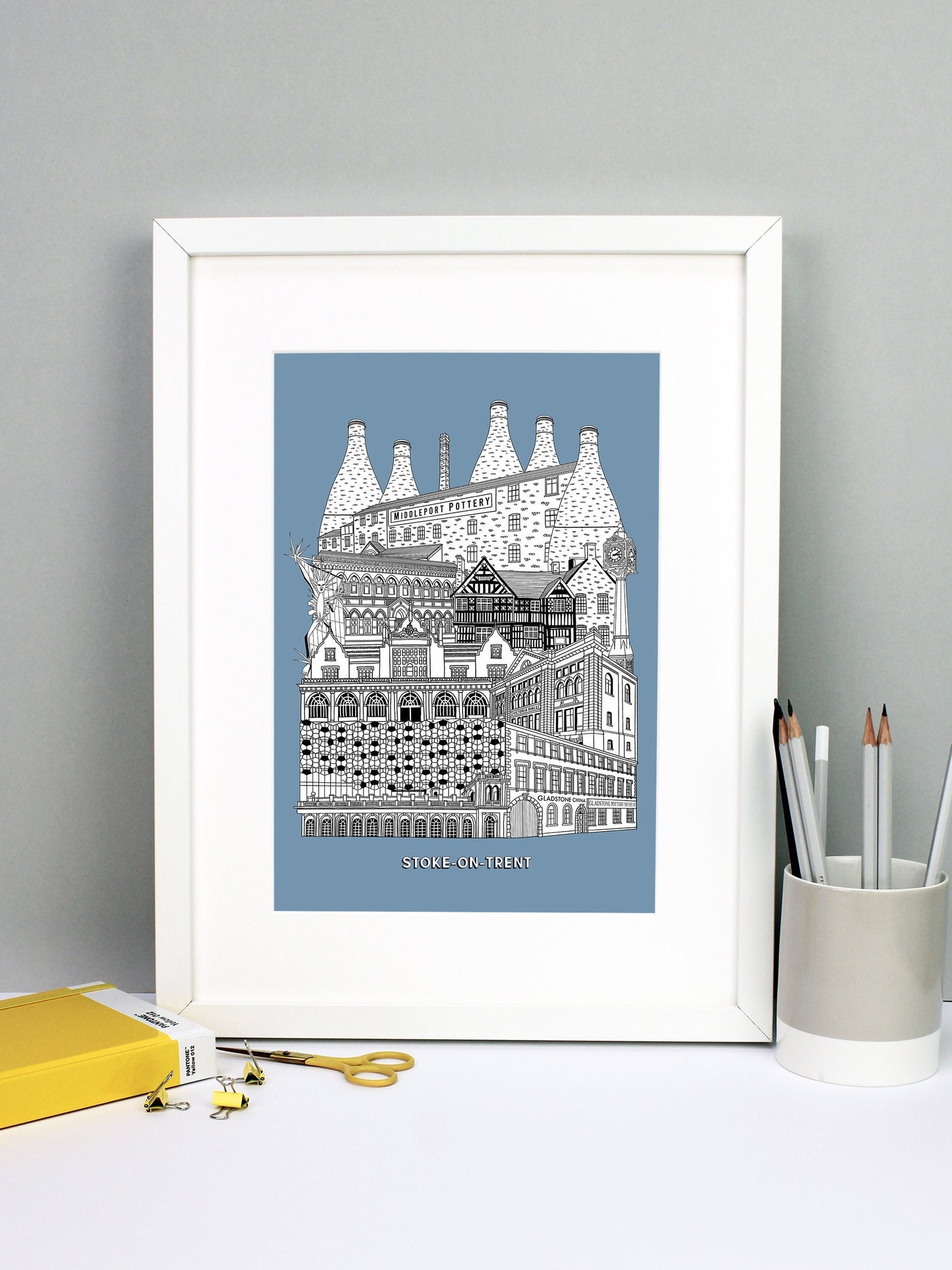 Beautifully detailed Stoke-on-Trent illustration print. The perfect gift for an engagement, wedding, birthday, anniversary and house warming. It features all the well known buildings and landmarks from the UK city. The buildings and landmarks featured are: Trentham Estate, Gladstone Pottery Museum, One Smithfield in Hanley, Stoke Train Station, Victoria Hall in Hanley, Blue Clock in Hanley, Ford Green Hall, Wedgwood Institute in Burslem, The Man of Fire (aka the Spiky Man or Jack Frost!) and Middleport Pott